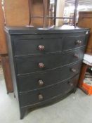 A 2 over 3 bow front chest of drawers.