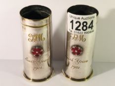 A rare pair of South African Boer War 1901 silver plated gun shells with enamel and silver rose