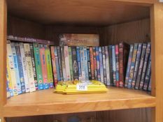 A collection of DVD's including Family Guy box sets, Super Heroes, Disney etc.