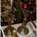 A pair of Victorian brass fire dogs.