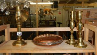 A pair of Victorian 'Diamond' candlestick, a brass ship's candle lamp and a copper bed warmer.