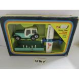 A boxed Corgi gift set 49 flying club, mint but in worn box.