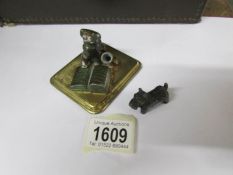 A spelter terrier reading a book pen stand and a small metal dog.