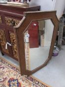 An oak framed mirror.
