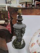 A metal table lamp base.