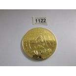 A large gold plated Queen Elizabeth II golden jubilee medallion.