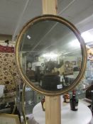 A circular mirror.