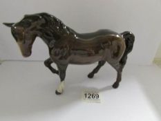 A Beswick horse.