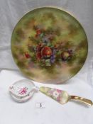 A Royal Crown Derby posies tea strainer with drip tray and a Royal Winton fruit decorated cake