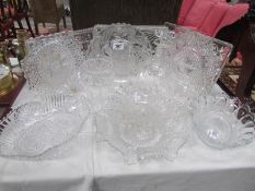 A mixed lot of glass ware including 3 trays, dishes, cut glass decanter, cake stand etc.