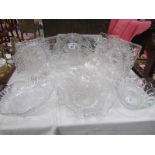 A mixed lot of glass ware including 3 trays, dishes, cut glass decanter, cake stand etc.