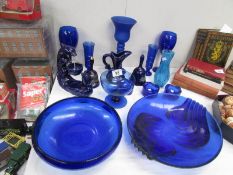 A mixed lot of blue glass ware.
