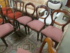 A set of 4 mahogany dining chairs.