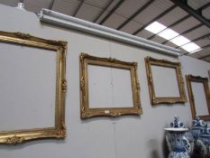 4 ornate gilded picture frames.