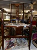 A mahogany inlaid elbow chair,