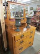 A satin walnut dressing table.