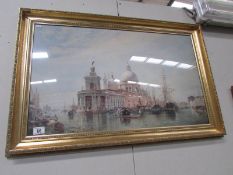 A gilt framed and glazed Venetian scene.