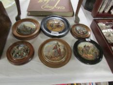 6 Victorian pot lids in wooden frames.
