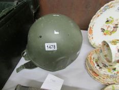 A vintage motor cycle helmet.