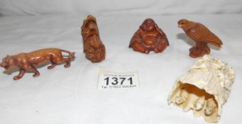 4 netsuke and one other item.