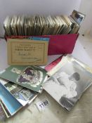 A large quantity of old postcards.