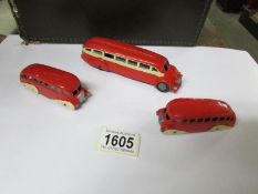 A Dinky pre war and post war streamline bus together with a Tootsitoy Greyhound coach.