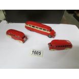 A Dinky pre war and post war streamline bus together with a Tootsitoy Greyhound coach.