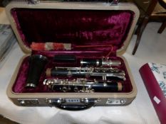 A cased Consol clarinet.