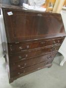 A mahogany bureau.