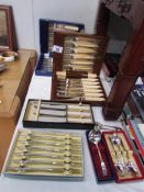 A mixed lot of cutlery including cased sets.