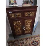 A Chinese cabinet.