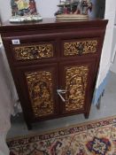 A Chinese cabinet.