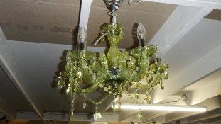 A green acrylic chandelier.