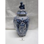 A blue and white ginger jar, nibbles to rim and chips to lid finial.