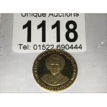 A 1979 Pobjoy Mint Margaret Thatcher solid 9ct gold medallion.