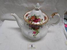 A Royal Albert old country roses teapot.