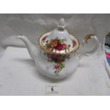 A Royal Albert old country roses teapot.