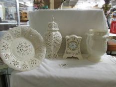 A Royal Cream ware puzzle jug, pot pourri jar, fruit bowl and clock.