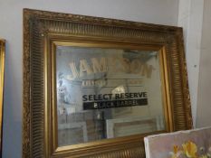 A gilt framed Jameson advertising mirror.