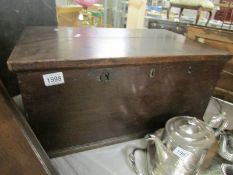 A 19th century trunk with candle box.