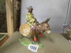 A rare Beswick Susie Jamaica donkey with rider (small chip on ear),