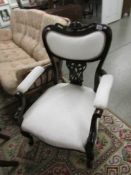 An Edwardian salon chair.