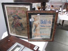 2 framed and glazed advertisements.