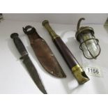 An old telescope a/f, a hunting knife in sheath and a ship's lamp, maker L B Solomons, London.