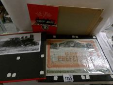 A photograph album containing photo's, ephemera, old railway company share certificates etc,