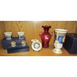 A Royal Worcester vase, trinket pots and candle holders together with a cranberry glass vase,.