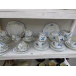 21 pieces of blue bird decorated tea ware and 20 pieces of bird decorated tea ware.