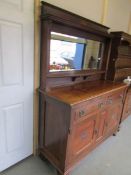 A mahogany mirror backed sideboard,