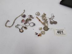 A mixed lot of jewellery including some silver.