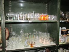 2 shelves of drinking glasses.